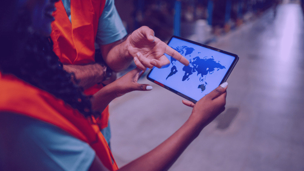 Banner depicts two professionals looking at a map on a tablet