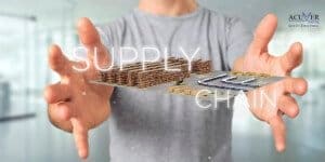 Banner depicts a man holding out a representation of supply chain
