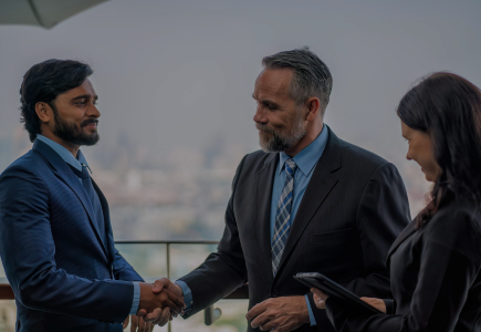 Image depicts people engaged in a discussion