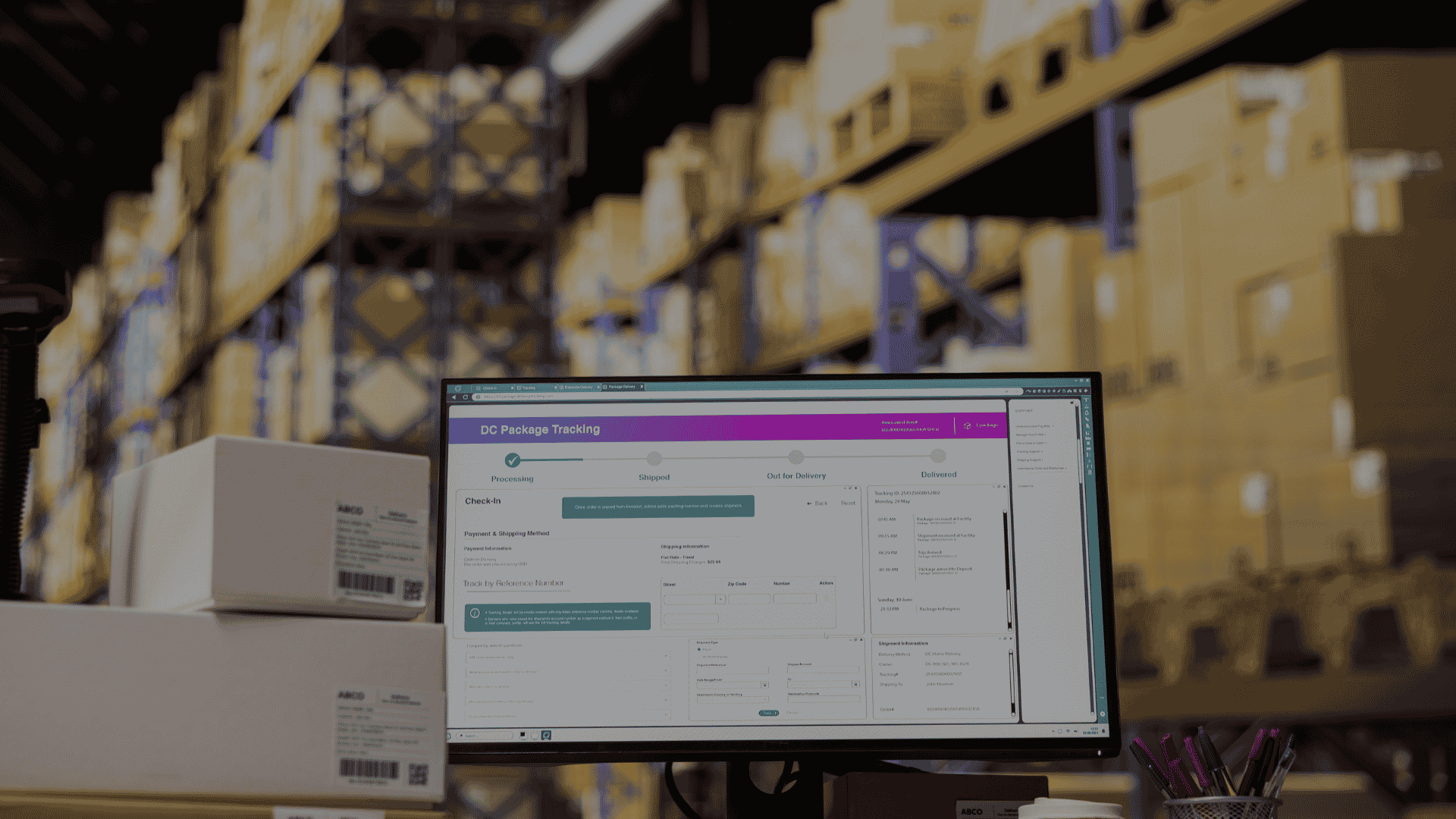 Computer monitor displaying a package tracking dashboard